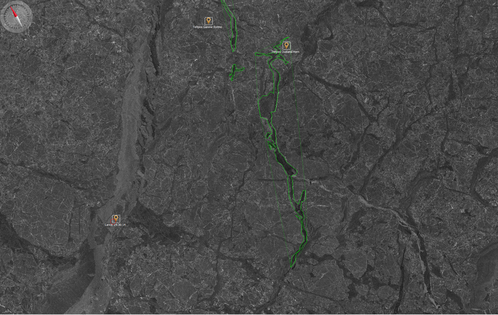 Black and white satellite image of a rugged terrain with green outlines marking specific areas, and three labeled points: Teltros Gamme Rotmo, Teltros Outland Horn, and Lance 43:56:14. A compass is in the upper left corner.